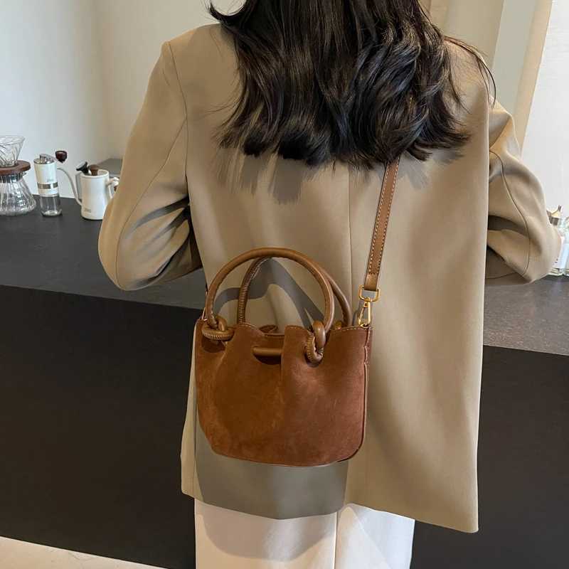 Frosted leather folding handheld bucket bag 2024 new fashionable Fi shoulder bag Versatile cross body bagXJ250412
