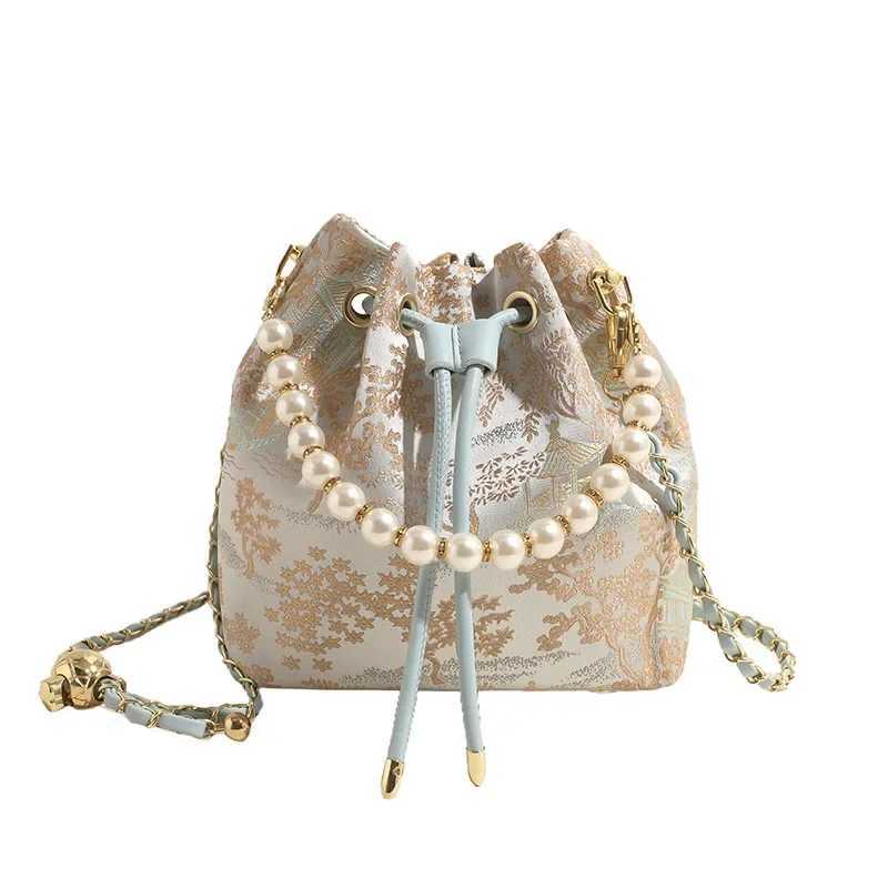 New China Bucket 2024 New Grid Style Pearl Portable Small Bag for Womens High end Chinese Messenger BagXJ250412