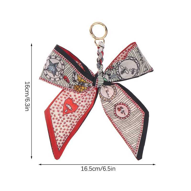 CC88Camellia Silk Scarf Bowknot Keychain Pendant Fresh Womens Bag Decor Ribbon Bow Romantic Bag Charm Fashion AccessoriesW251112