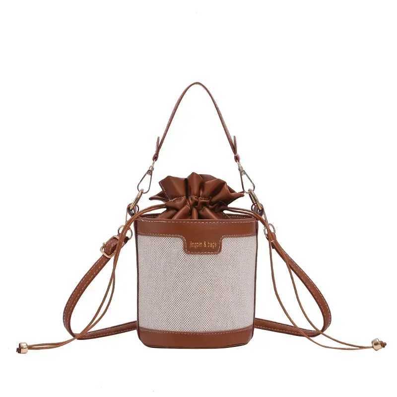 Womens shoulder bag cylindrical PU leather bucket womens cross body bag casual Drstring handbag summer travel shoppingXJ250412