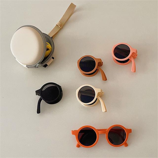 New cute baby one year old posing glasses, UV resistant and sunscreen sunglasses, children's round frame folding sunglasses