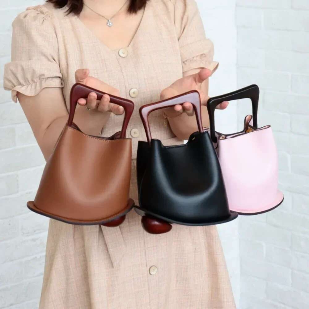 New Cowhide Genuine Leather Minority Korea Handbags Commuter Women Simple All-Match Bucket Large Capacity Advanced Shoulder Bag