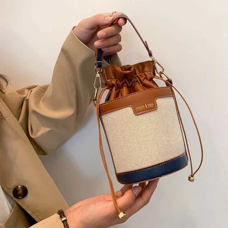 Womens shoulder bag cylindrical PU leather bucket womens cross body bag casual Drstring handbag summer travel shoppingXJ250412