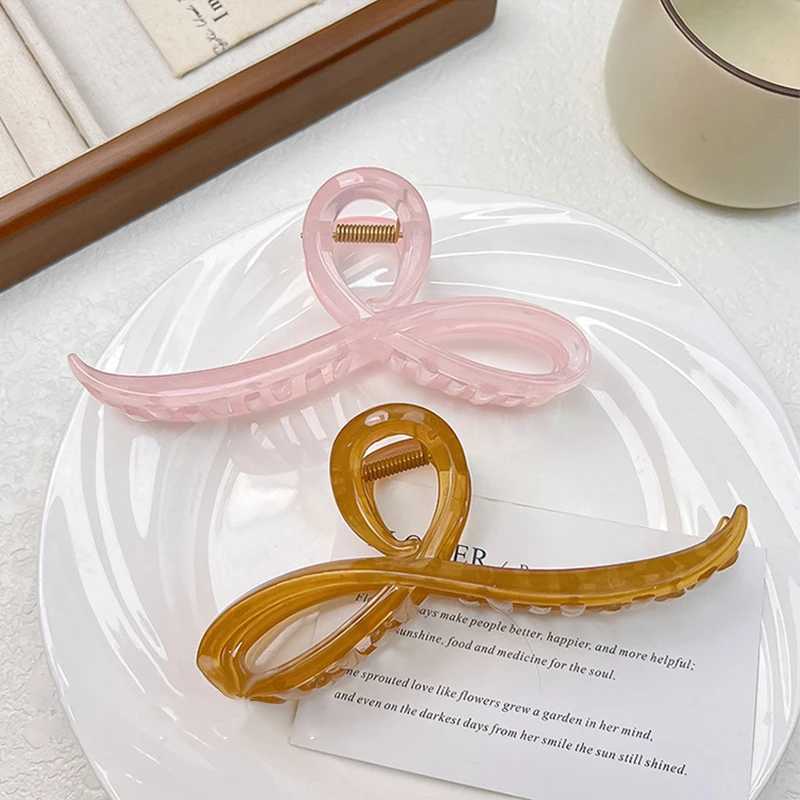 Elegant jelly colored bow hair claws suitable for women sweet hair decoration hair clip at the back fashionable hair accessories Y2504012