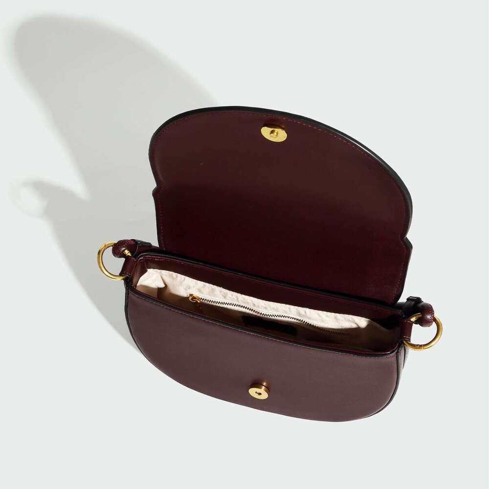 Spring New Product: Women's Wine Red Saddle Bag, Color Contrasting Thread Cutting Decoration, Handheld Single Cross Shoulder Flip Hard Bag