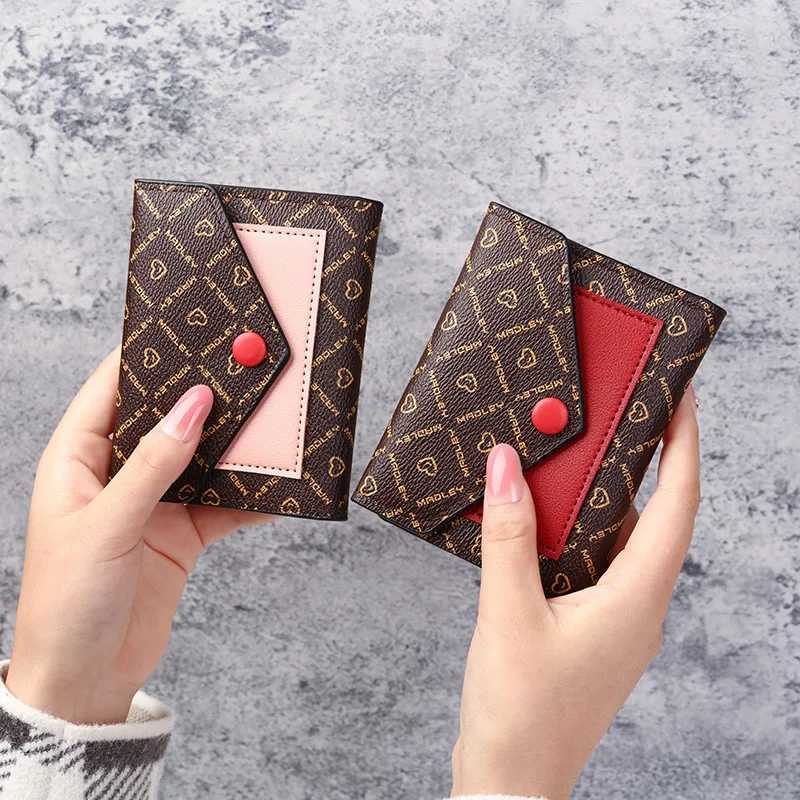 Leather small wallet womens design splicing short wallet womens short coin zipper wallet card holder Z250411