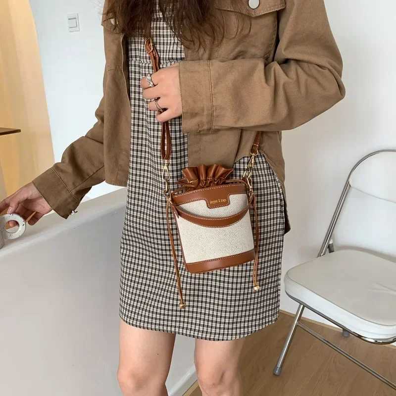Womens shoulder bag cylindrical PU leather bucket womens cross body bag casual Drstring handbag summer travel shoppingXJ250412