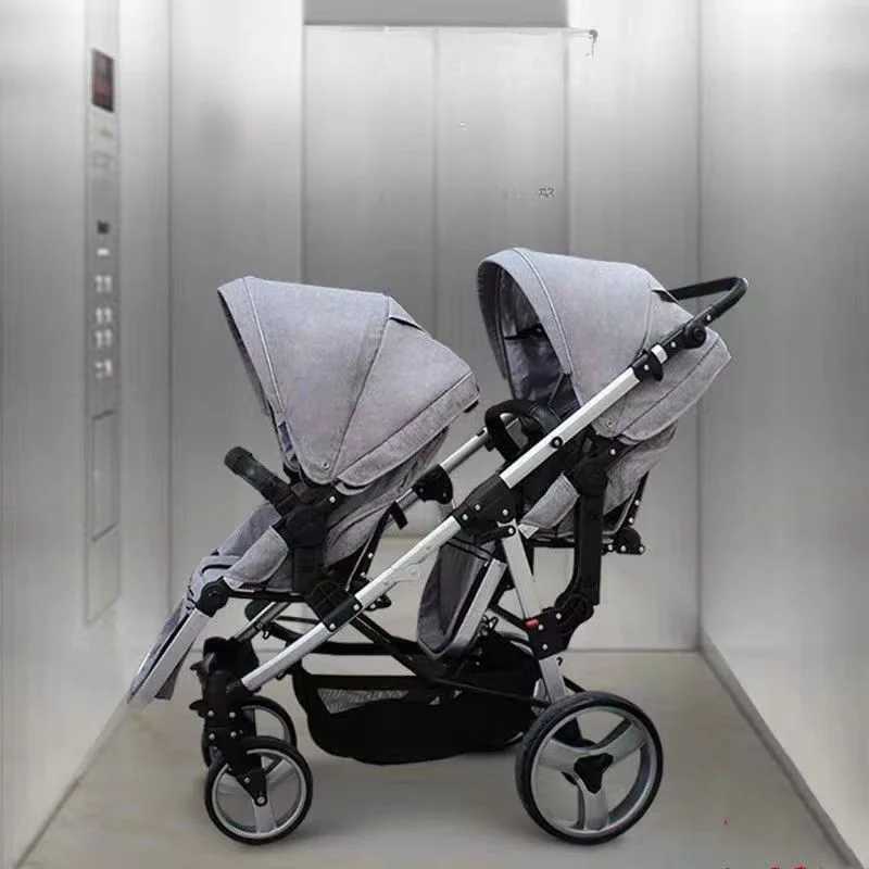New dual baby stroller with adjustable seat height and orientation. High view dual baby stroller with adjustable stroller arms W250411