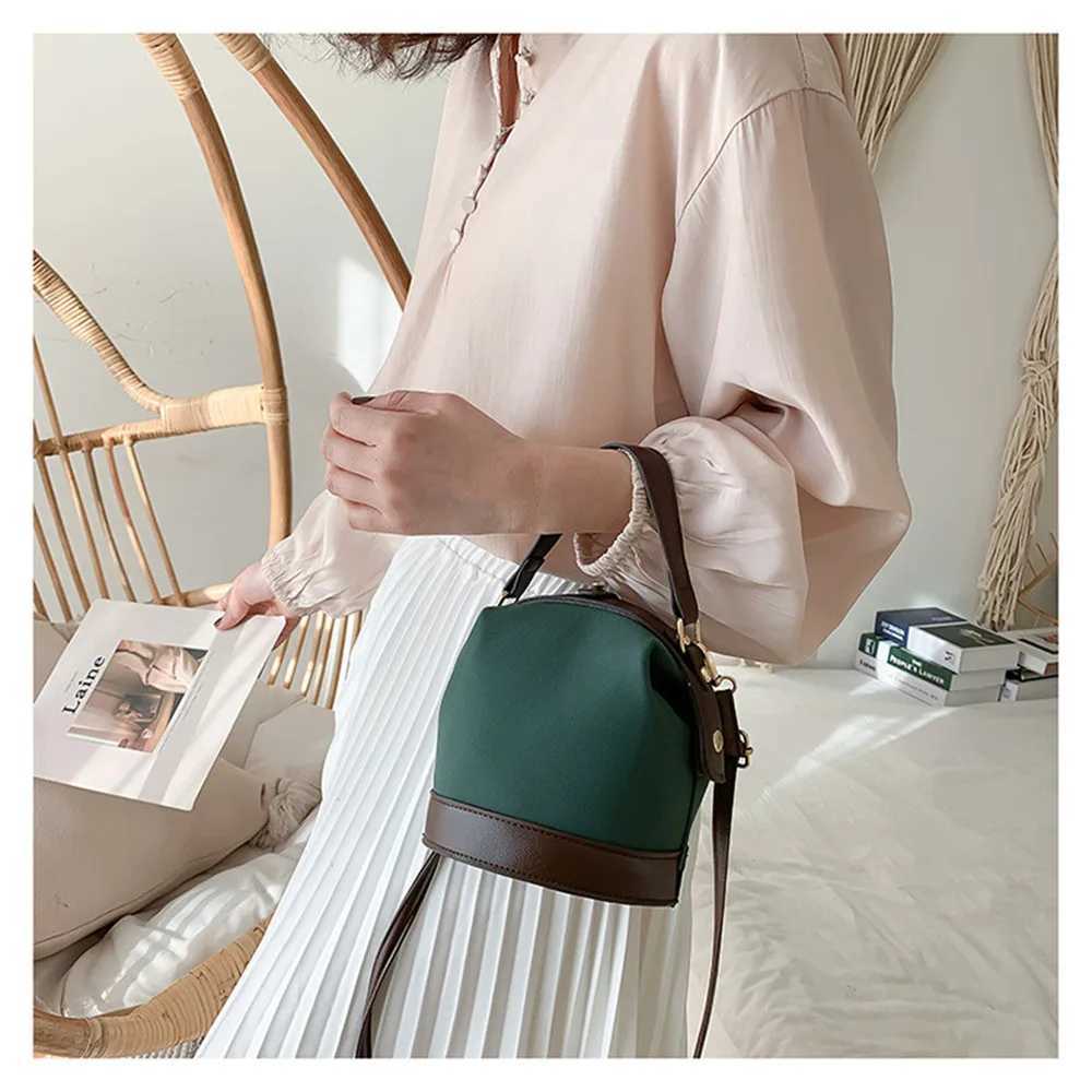 New retro Fi womens bucket bag travel shoulder messenger bag womens frosted leather handbag metal bucket handbagXJ250412