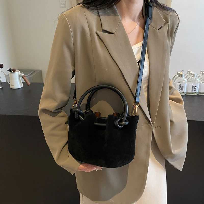 Frosted leather folding handheld bucket bag 2024 new fashionable Fi shoulder bag Versatile cross body bagXJ250412