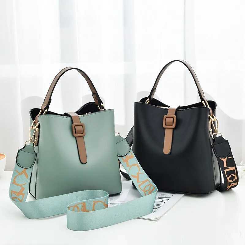 Elegant womens bucket bag with detachable wide shoulder straps sturdy solid color cross body shoulder bagXJ250412