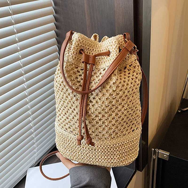 Knitted Bag Womens 2024 New Fi Bucket Bag Summer Niche 100 Str Beach Single Shoulder Cross BagXJ250412