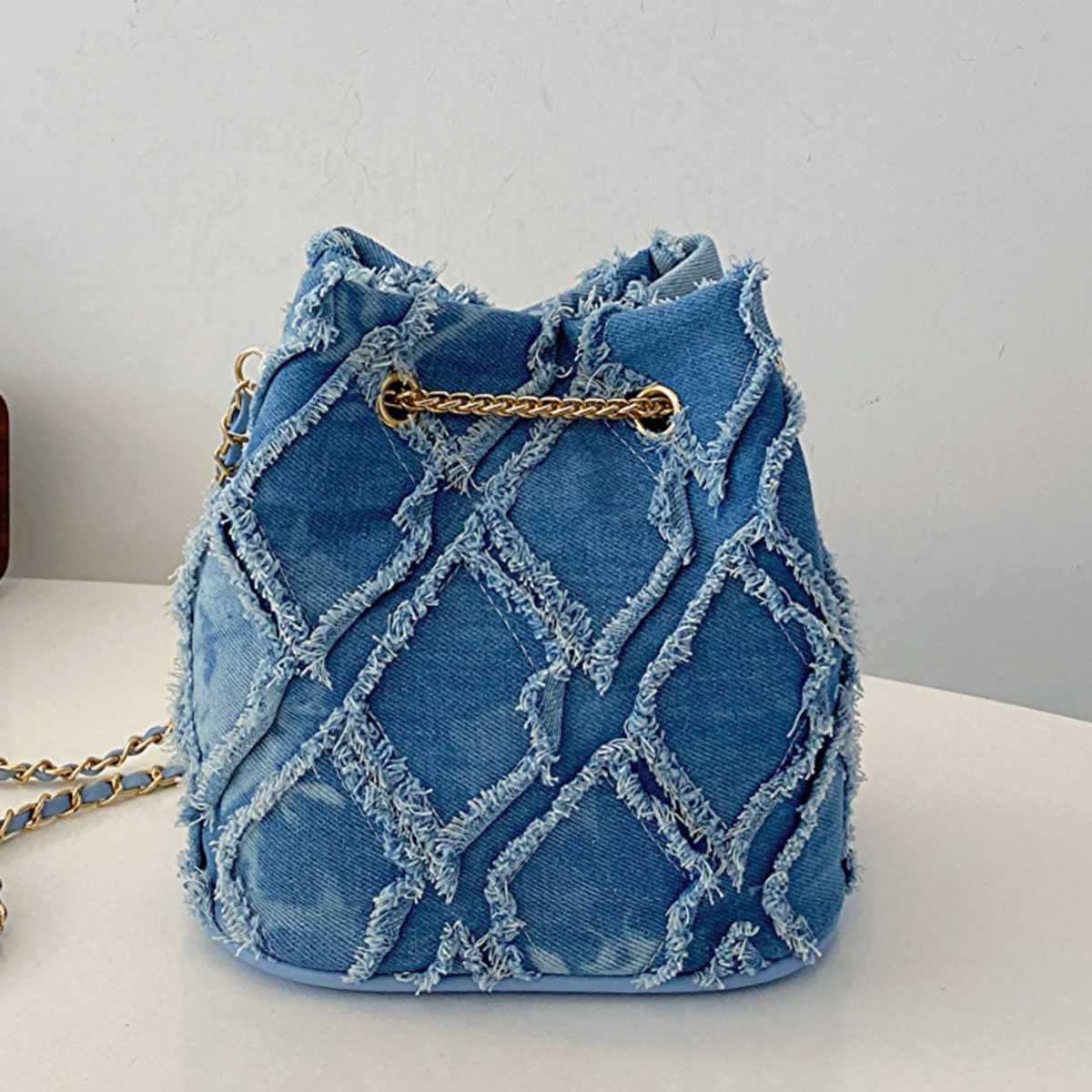 New popular diamond-shaped raw edge shoulder bag simple and fashionable messenger bag elegant and versatile daily bucket bagT2511112