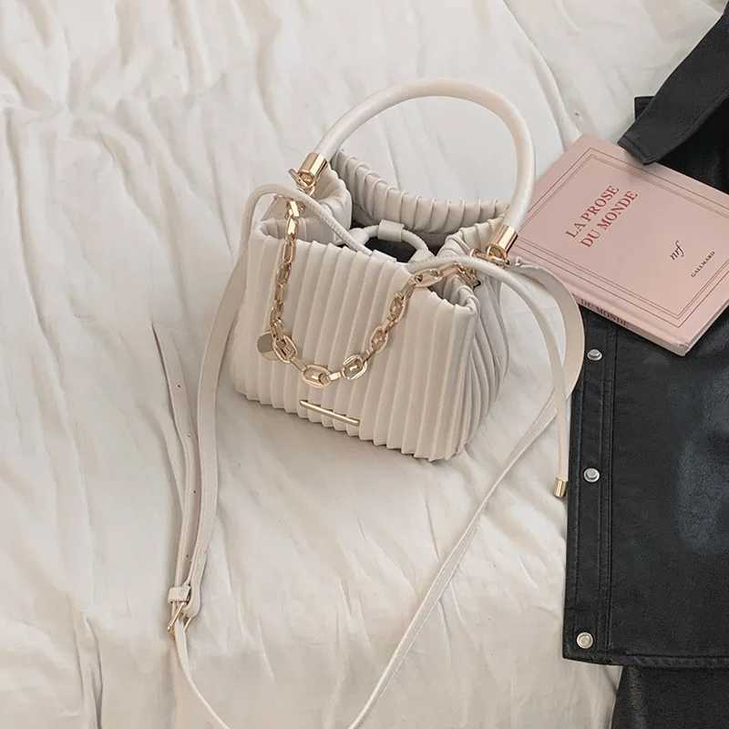 Sweet Fi wallet and handbag 2023 new pleated bucket elegant Korean Versi Fi casual cross body bagXJ250412