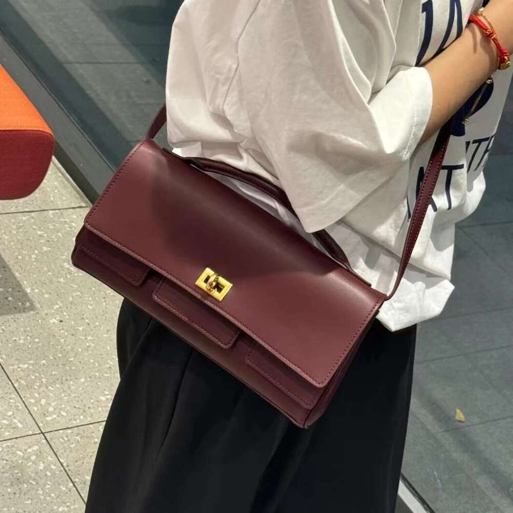 genuine leather handbag 2025 new niche design lock small square vintage motorcycle style cowhide oneshoulder crossbody bag
