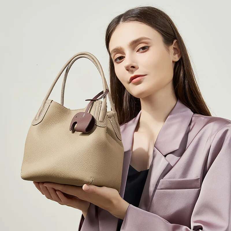 2024 Summer New Fashion Leather Bucket Niche First Layer Cowhide Retro Shoulder Oblique Span Portable Vegetable Basket Bag