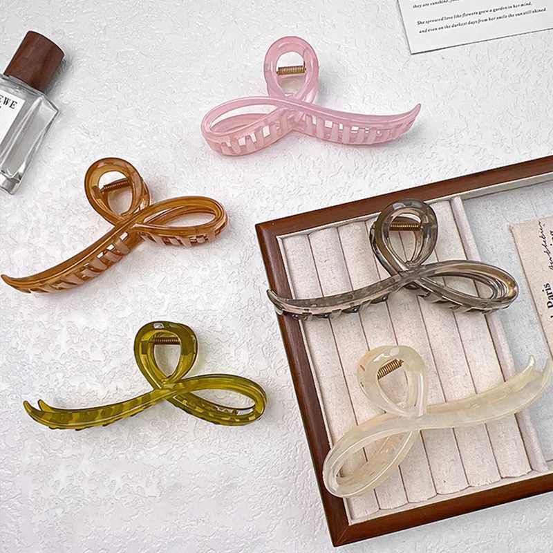 Elegant jelly colored bow hair claws suitable for women sweet hair decoration hair clip at the back fashionable hair accessories Y2504012
