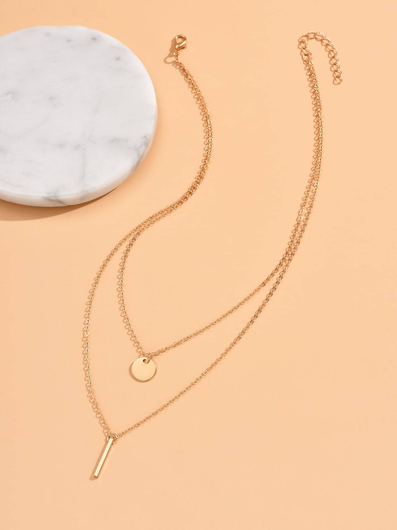 Double layered geometric element necklace