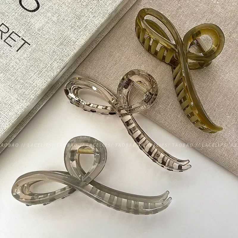 Elegant jelly colored bow hair claws suitable for girls sweet decoration with hair clips at the back fashionable hair accessories Y2504012