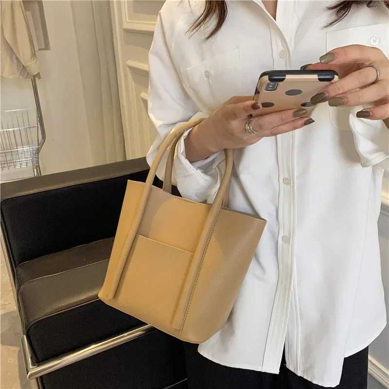 Casual womens horizontal bag foldable casual textured bucket bag handbag designer bag womens childrens bagXJ250412