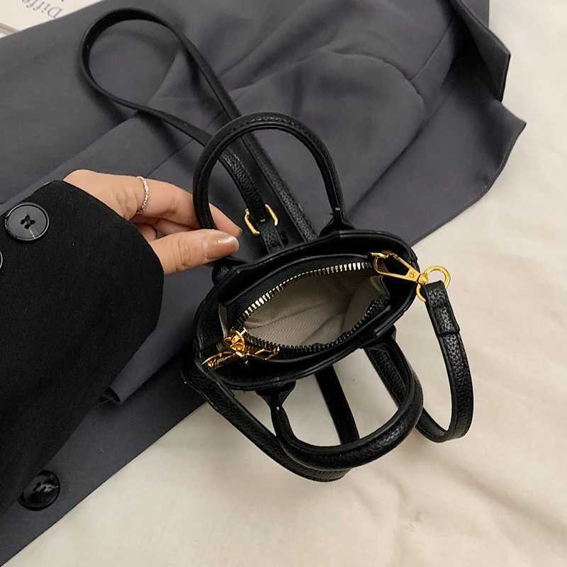 FI Super Mini Cross shaped Bag Cute Womens Lipstick Bag Solid Color Pu Leather Bag Coin Wallet Earplug Bag Mini Bucket HandbagXJ250412