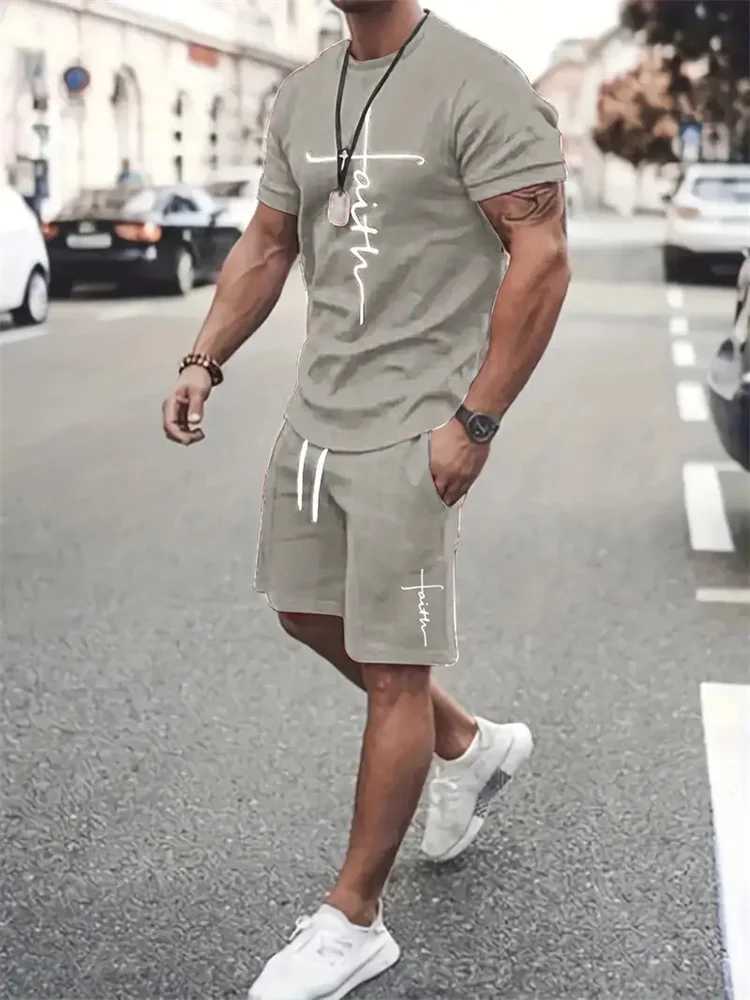 Mens T-shirt and shorts set fashionable mens cross printed short sleeved two-piece set oversized outdoor beach sports mens plus size setXJ250412
