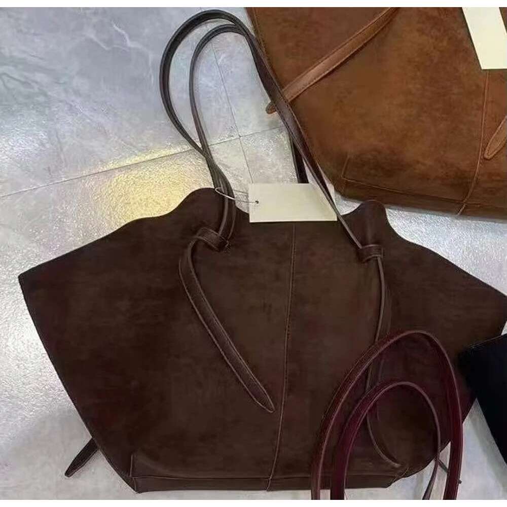 2024 Niche Design Wing Matte Cowhide Large Capacity Handheld Tote Suede Autumn And Winter Women's Shoulder Bag