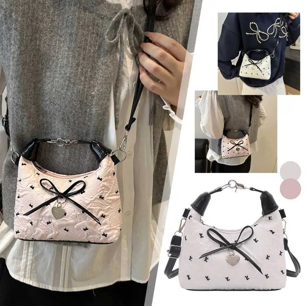 Bow Crossbody bag for women Sweet Fashion Print Metal heart Pendant Hand-held Single shoulder bag Commute Handbag Underarm pouchT2511112