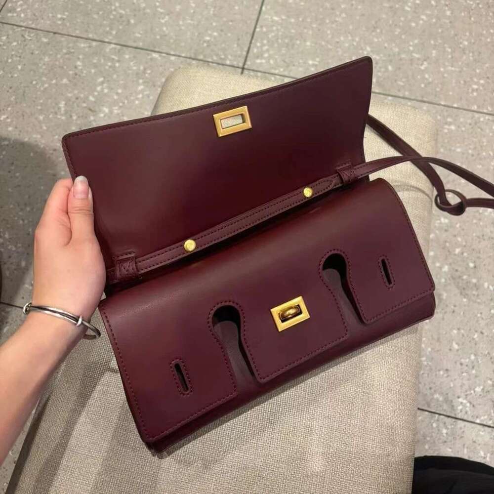 genuine leather handbag 2025 new niche design lock small square vintage motorcycle style cowhide oneshoulder crossbody bag