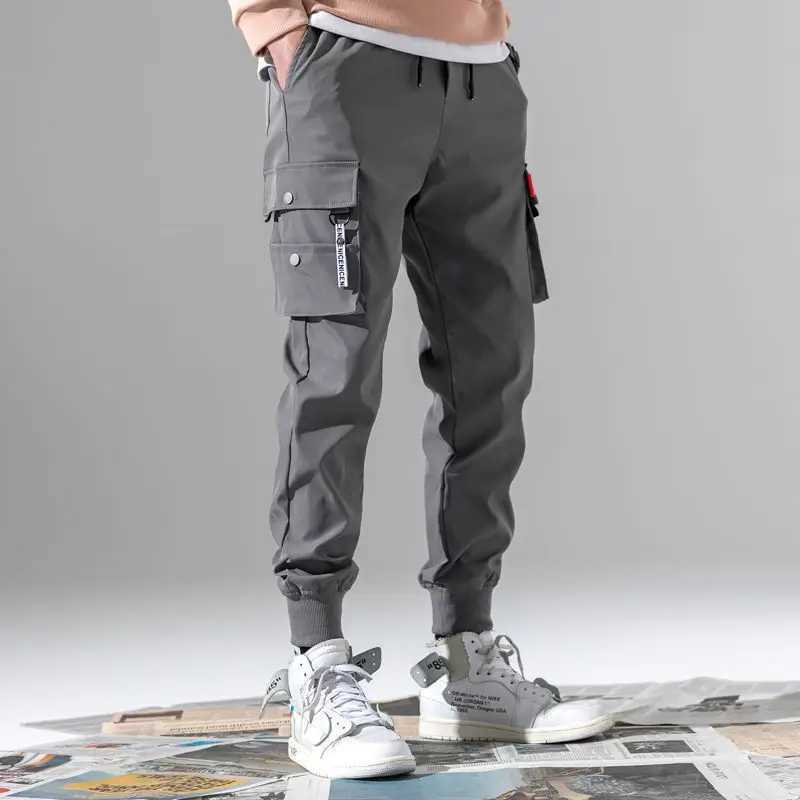 Classic running streetwear casual mens ribbon harem jogging pants mens slim fit spring cargo pants multi pocket womens Trousers W250411