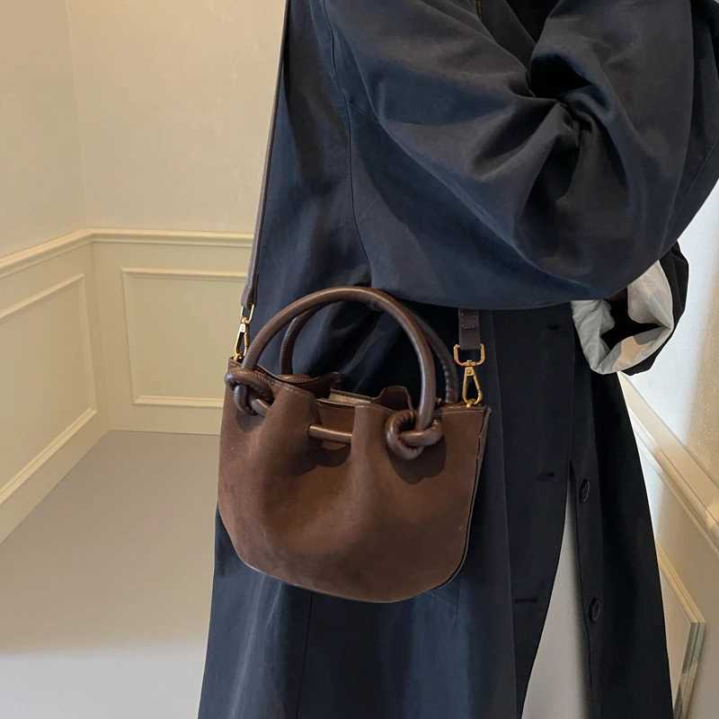 Frosted leather folding handheld bucket bag 2024 new fashionable Fi shoulder bag Versatile cross body bagXJ250412