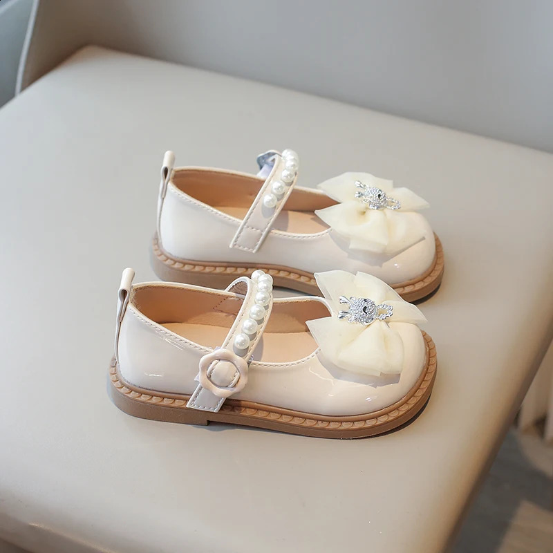 Girls shoes 2-12 years old beige cartoon bow pearl girl baby Mary simple shoes black soft sole anti slip childrens baby sandals 250411