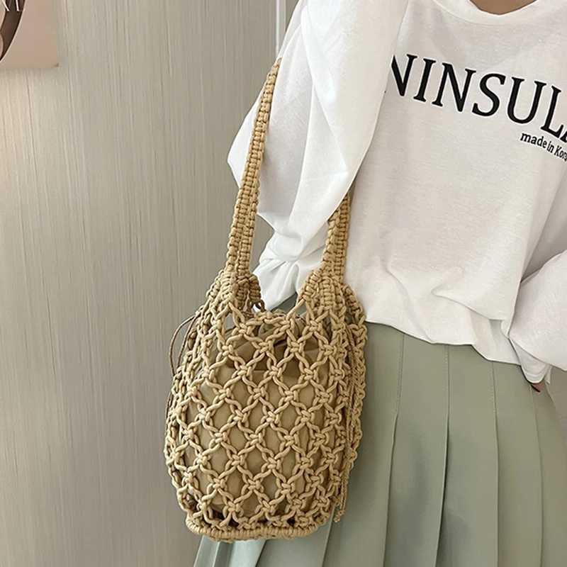Mini design Str womens bag new summer high-end handbag water bag hot selling woven beach cross body bagXJ250412