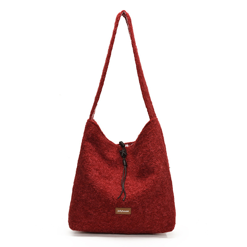 2025S Designer Women S Bag Winter Plush Bucket With Large Capacity Casual And Lazy Style Tote Fashionable Women S Bag Work Commuting Shoulder Bag