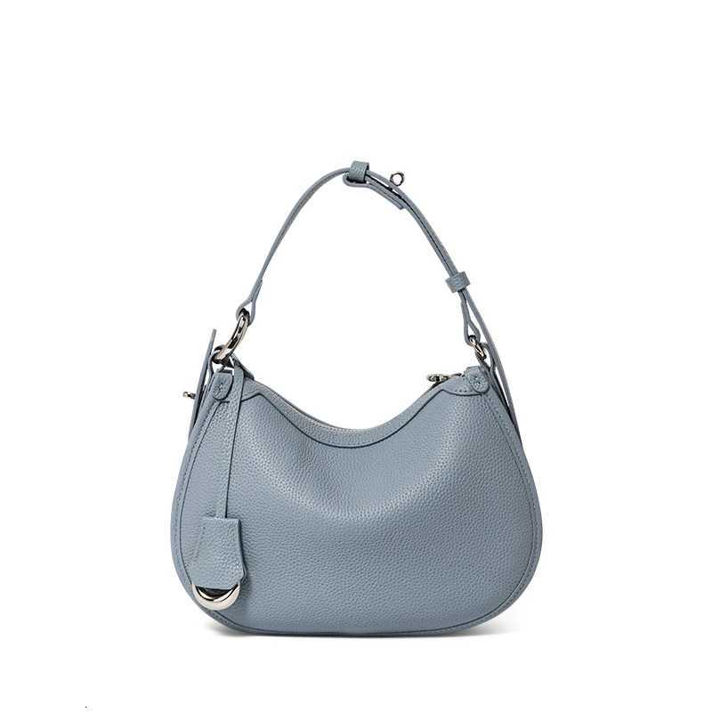 The first layer of cowhide underarm shoulder bag 2025 new niche design minimalist blue fashion soft leather hand saddle bagW251112