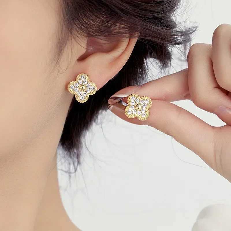Luxury diamond-encrusted copper four-leaf clover with necklace is live-streaming by a female Quality materials are carefully crafted to suit a variety of scenes