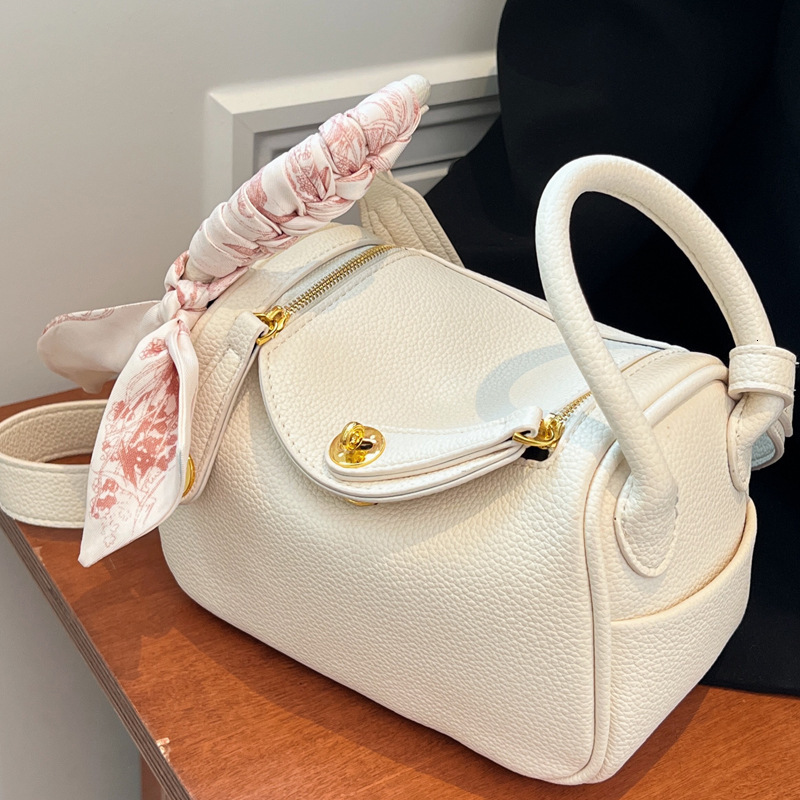 2025S Designer Women S Bag High End Crossbody Textured Hand Held Small Bag New Popular Versatile And Stylish Women S Shoulder Bag