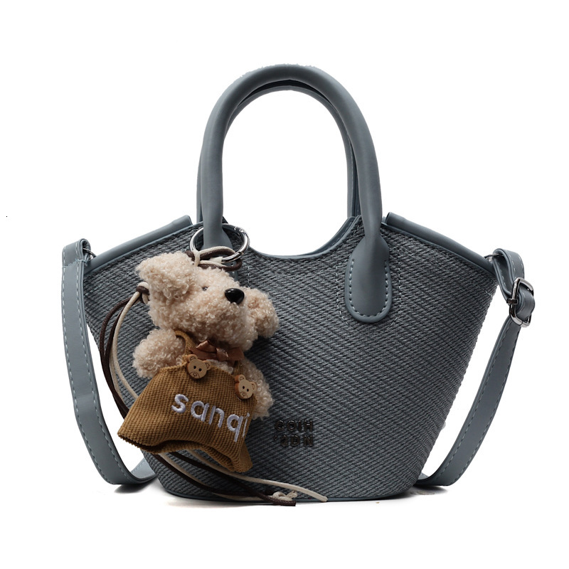 2025S Designer Niche Design Single Shoulder Women S Spring And Summer Color Contrasting Crossbody Urban Minimalist Handheld High hot End Water Bucket 