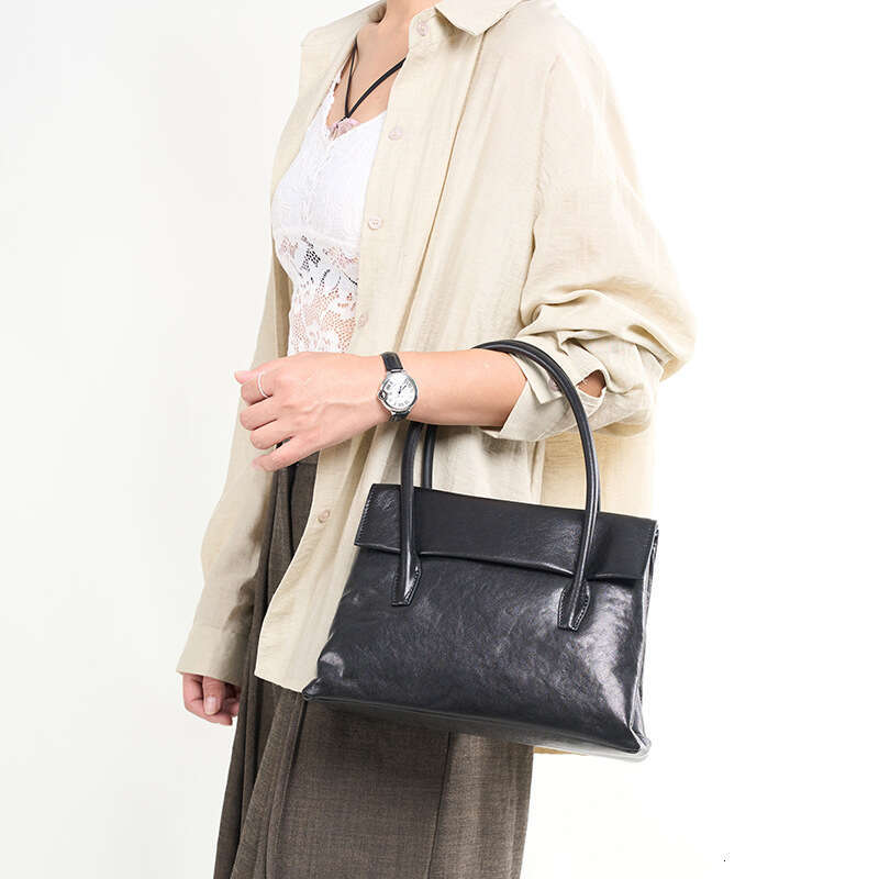 Luxury Bags Designer Fashion m Niche Brand Autumn & Winter Fashion Top Handle Bags New Genuine Leather Vegetable Tanned Cowhide One Shoulder Cross-bod