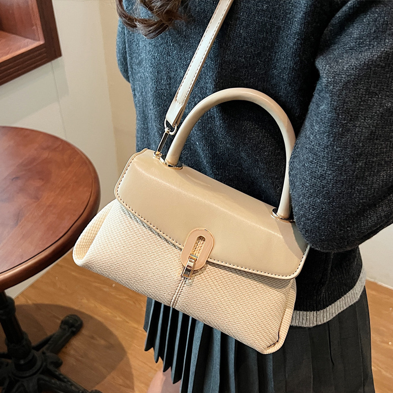 2025S Designer Women S Bag Texture Handheld New Women S Lychee Pattern Small Room Versatile Simple Single Shoulder Crossbody Bag