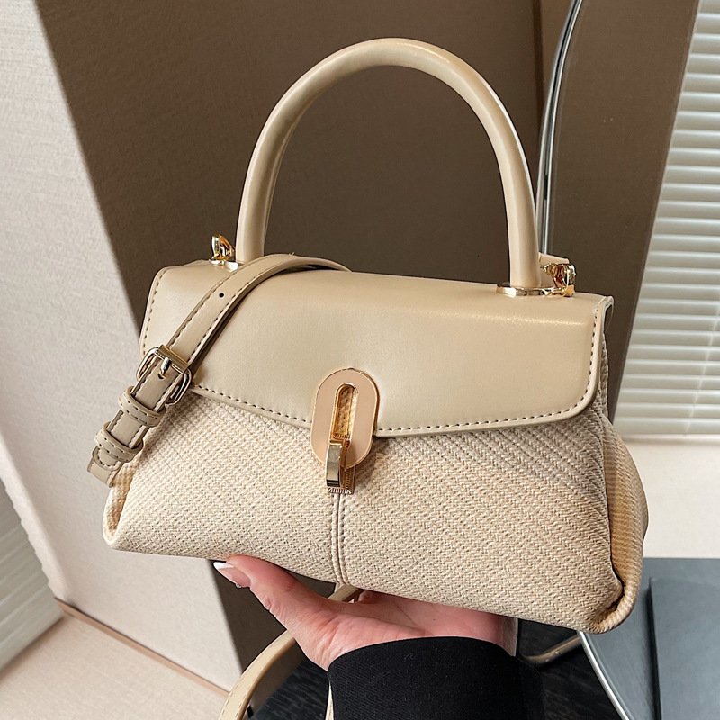 2025S Designer Women S Bag Texture Handheld New Women S Lychee Pattern Small Room Versatile Simple Single Shoulder Crossbody Bag