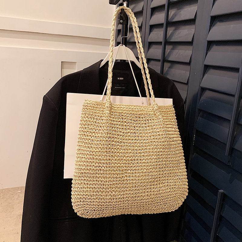 2025S Designer Women S Bag Holiday Large Capacity Fashionable Niche Shoulder New Women S Trend Simple Grass Woven Tote Bag