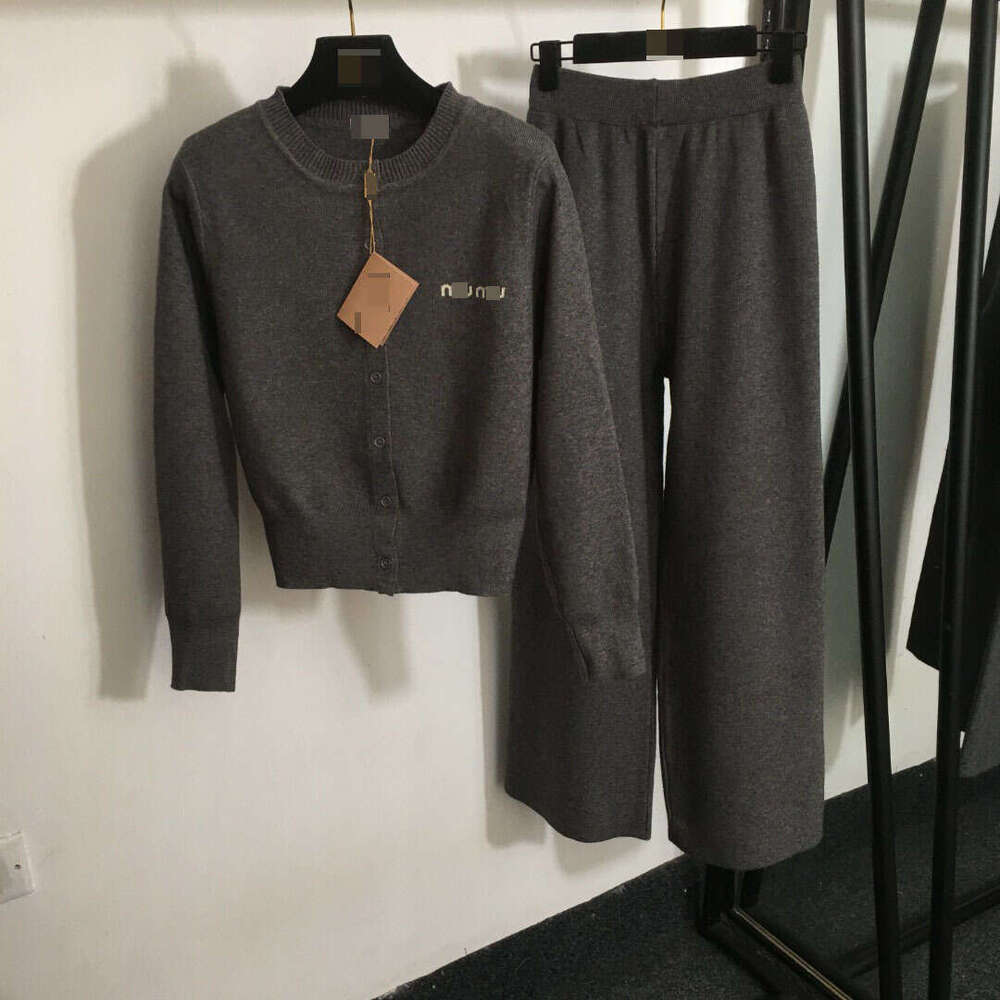 Designer clothing 25 Nanyou New Sports Set Simple Letter Long Sleeve Knitted Cardigan+High Waist Wide Leg Pants