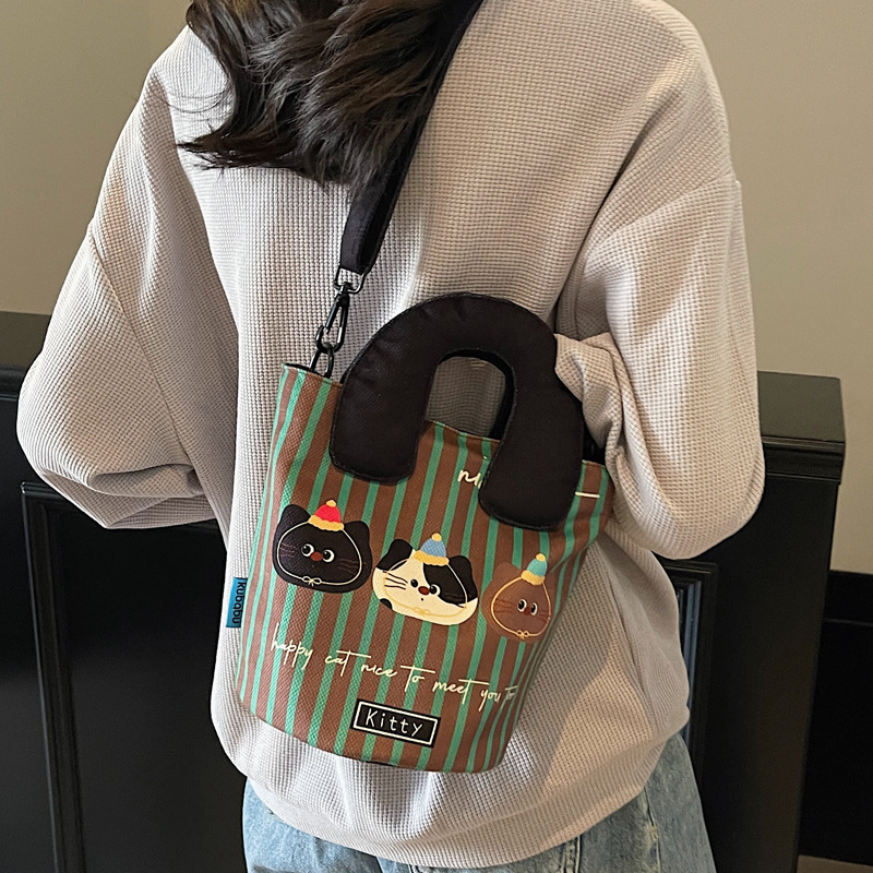 2025S Designer Women S Bag Exquisite Crossbody Illustration Design Funny Graffiti Bucket Bag New Cute Cartoon Casual Handbag