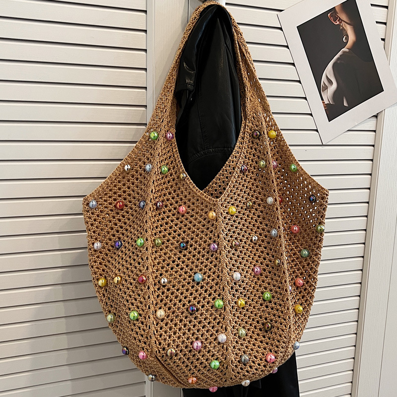 2025S Designer Women S Bag Knitted Handbag Handheld Women S Japanese Handwoven Hollow Casual One Shoulder Tank Top Large Capacity Crossbody Bag