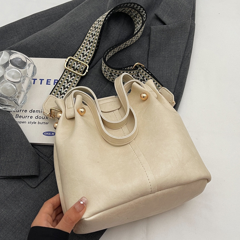 2025S Designer Women S Bag Fashionable And Simple Large Capacity Handbag For Women New Texture Bucket Bag Wide Strap Single Shoulder Crossbody Bag