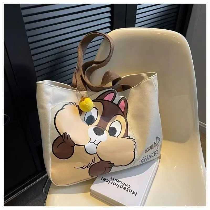 Disney New Disney Chichititi Cartoon Printed Large Capacity Womens Handbag Daily Travel Mummy Bag Fashion Shoulder BagXJ250412