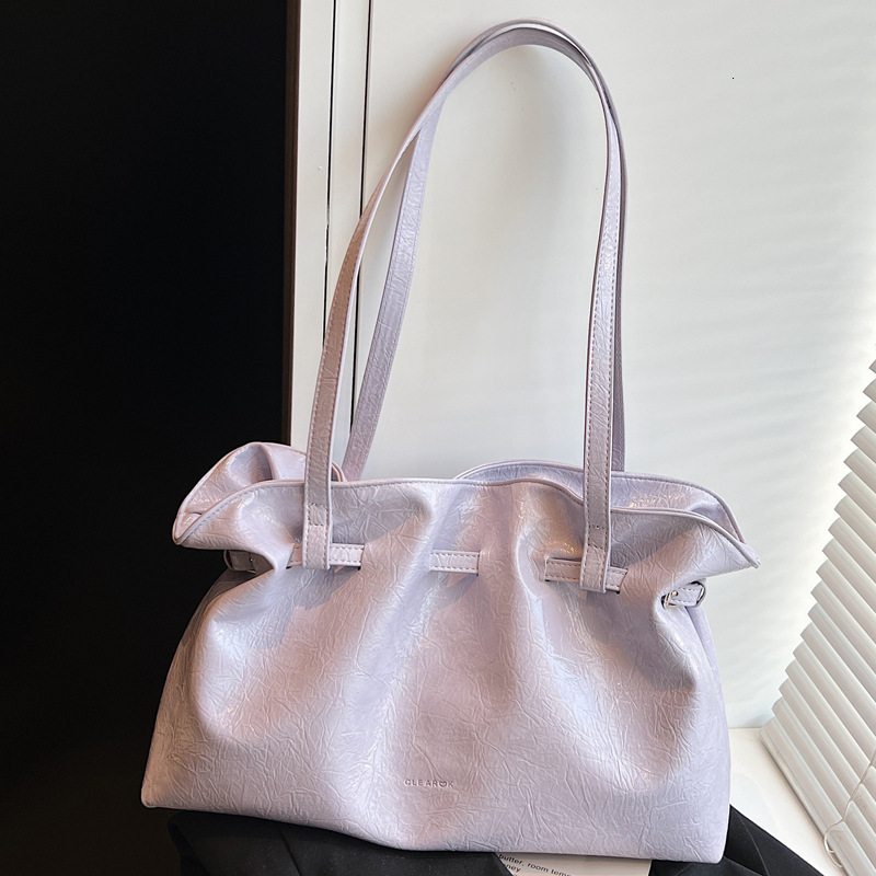 2025S Designer Women S Bag I Shoulder Bag With Niche Design Stylish Pleated Bag Simple And Large Capacity Commuting Texture Drawstring Crossbody