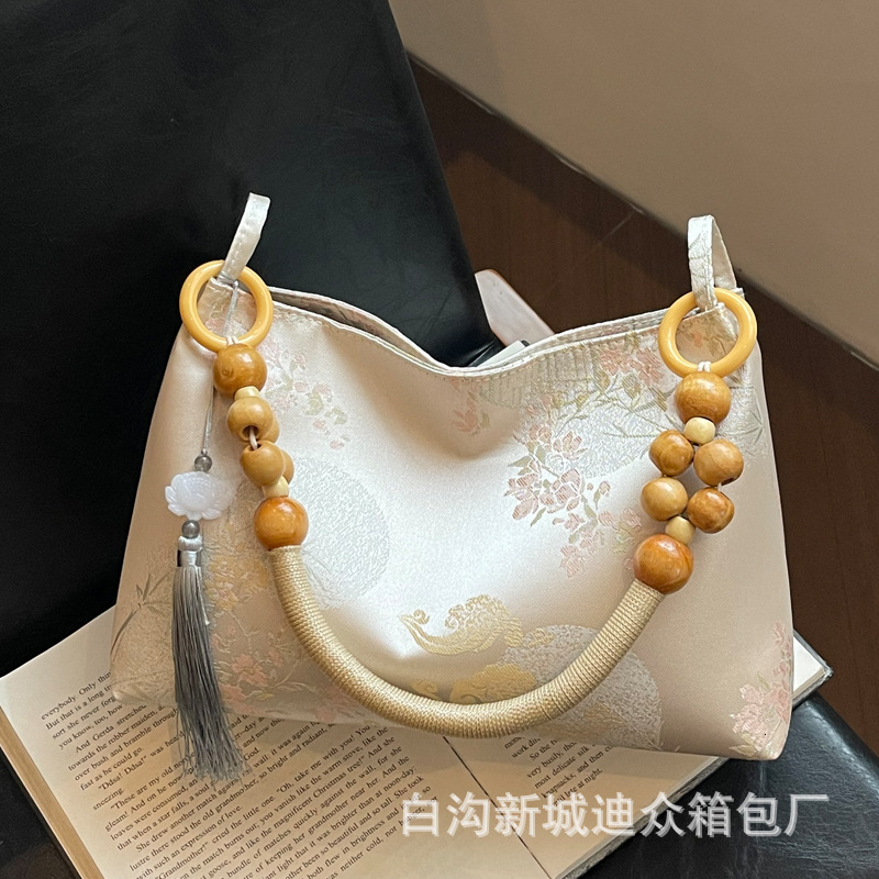 2025S Designer Women S Bag New For Women New Niche Velvet Embossed Artistic Chinese Style Armpit Bag Simple Wooden Bead Casual Handbag