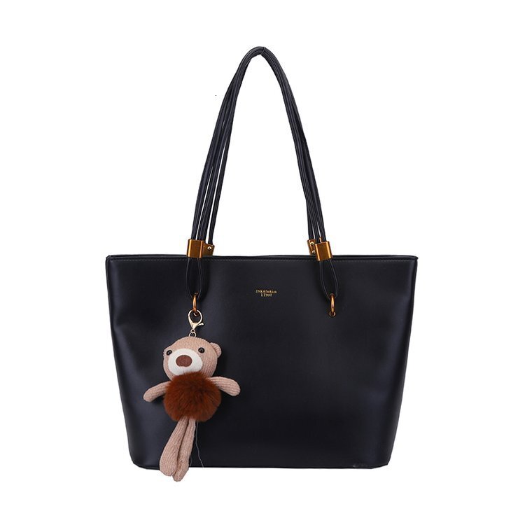 2025S Designer Women S Bag Large Capacity Minimalist Tote For Women S Outdoor Commuting Versatile Shoulder Bag PU Texture Solid Color Casual Handbag